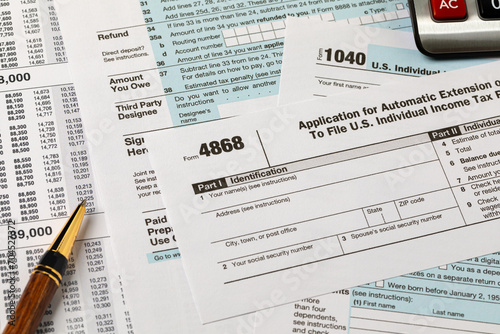 Form 4868 automatic filing extension for federal income taxes. Income tax return filing deadline, delay and penalty concept. 