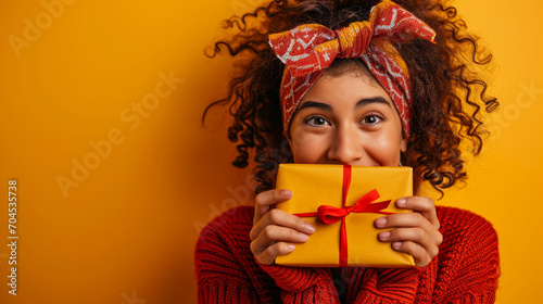 Playful woman cheekily hiding gift box behind her, AI Generated photo