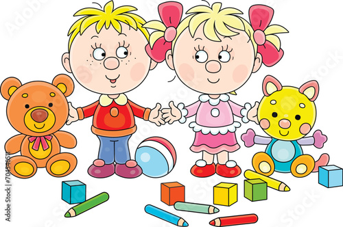 Happy little girl and boy with their funny toy bear and cat in a playroom of a kindergarten, vector cartoon illustration isolated on a white background
