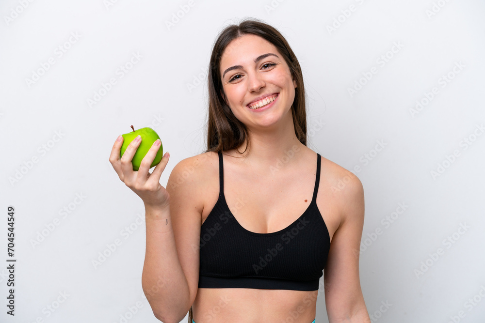 Young girl isolated on white background with an apple and happy Young girl isolated on white background with an apple and happy