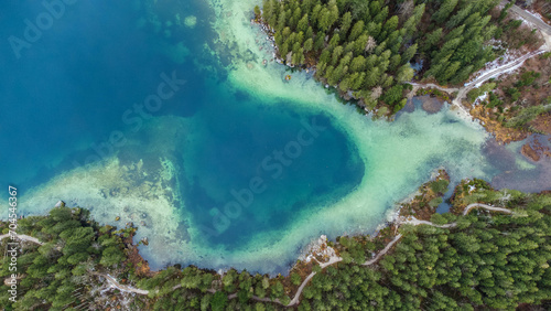 Aerial view over crystal clear water at the Berchtesgaden Hintersee lake and Alps Mountain in Germany