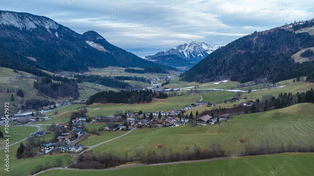 Aerial view over small mountain town Itter in Austrian Alps