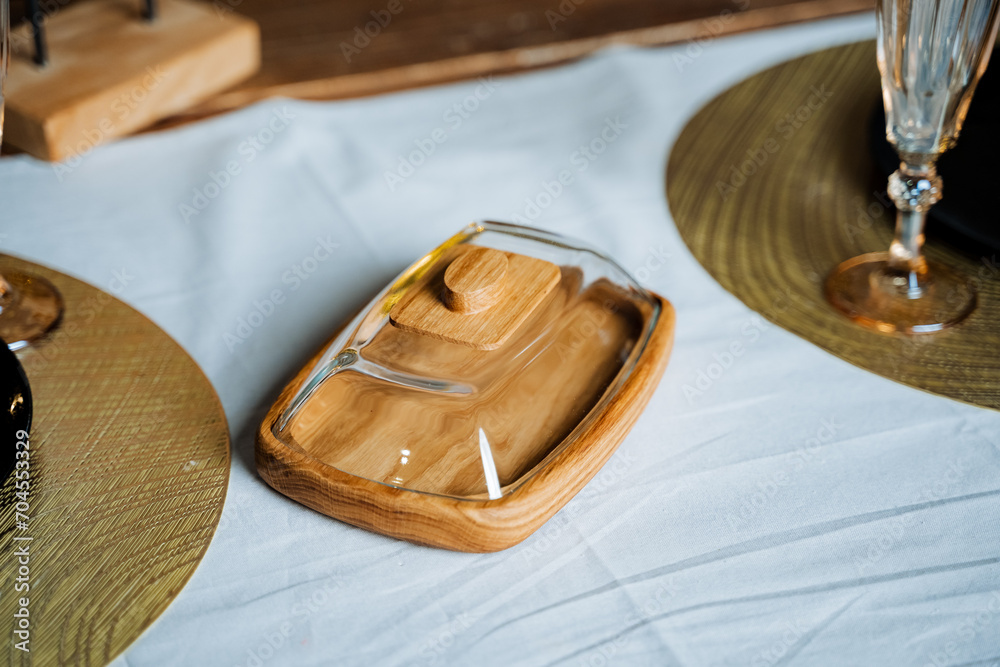 Handmade oiler lying on the table, handicraft product, kitchen utensils.