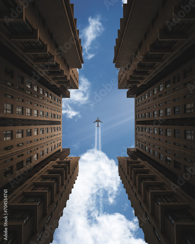 Plane bottom view with residential buildings