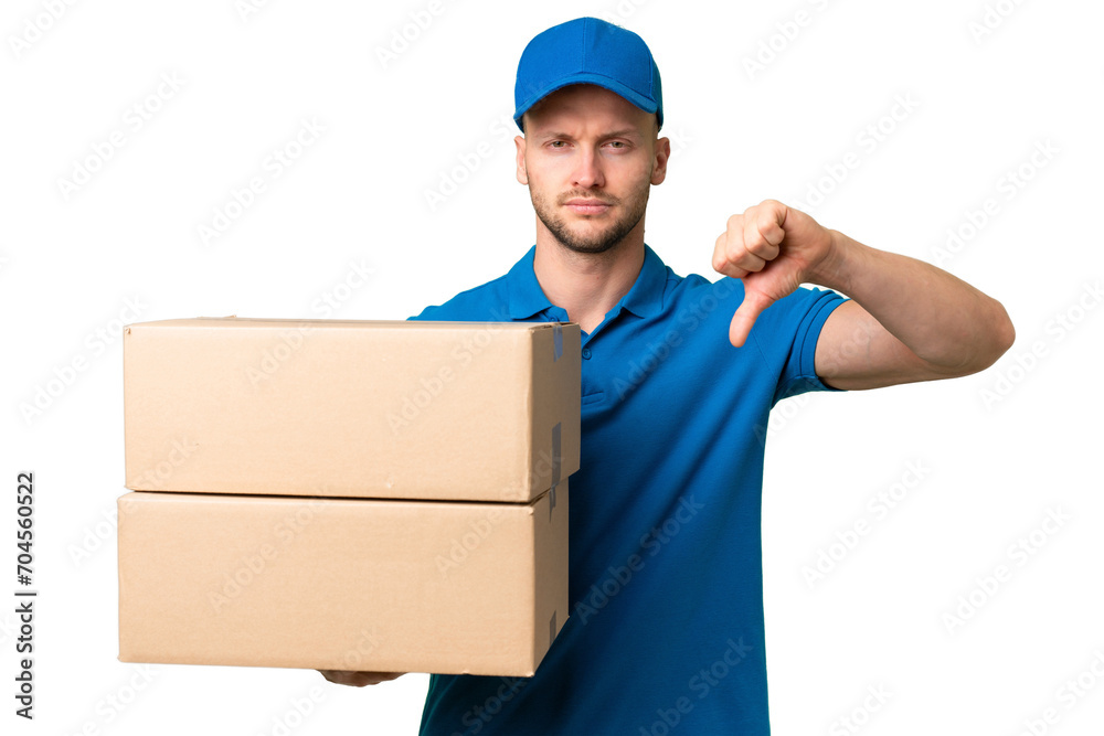 Delivery caucasian man over isolated background showing thumb down with negative expression Delivery caucasian man over isolated background showing thumb down with negative expression