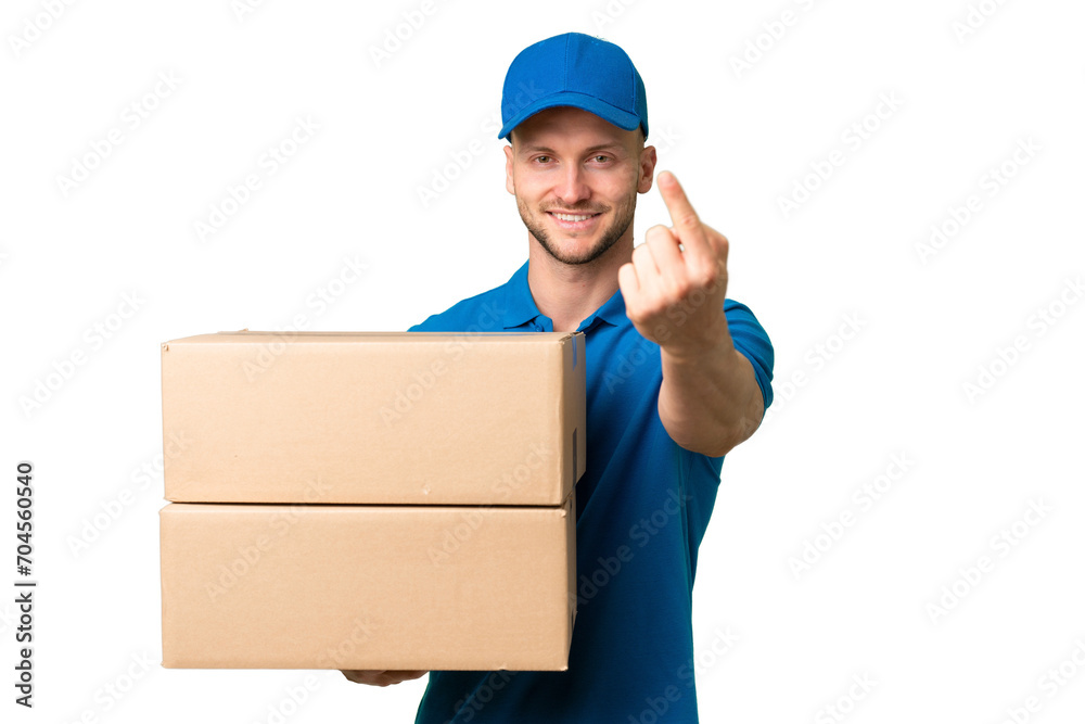 Delivery caucasian man over isolated background doing coming gesture Delivery caucasian man over isolated background doing coming gesture
