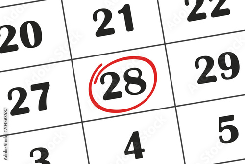 Calendar date, 28 day is circled in red marker. Monthly calendar. Save the date written on your calendar.