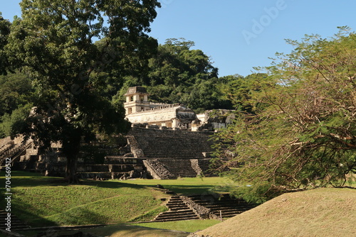 Catching a glimpse of the Palace/El Palacio and its tower at the archaeological site of Palenque, Mexico