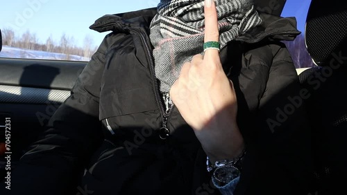 Hand gesture - show one finger of the hand, index finger. The sign of one