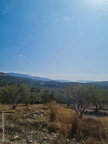 Greece island many hills with blue sky and white clouds