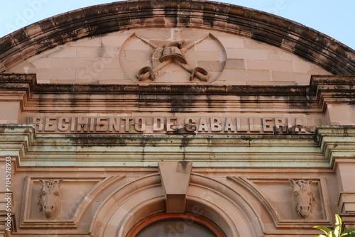 The facade of the building that now houses the botanical garden of Oaxaca, former Regimiento de Caballeria/Cavalry Regiment, Mexico photo