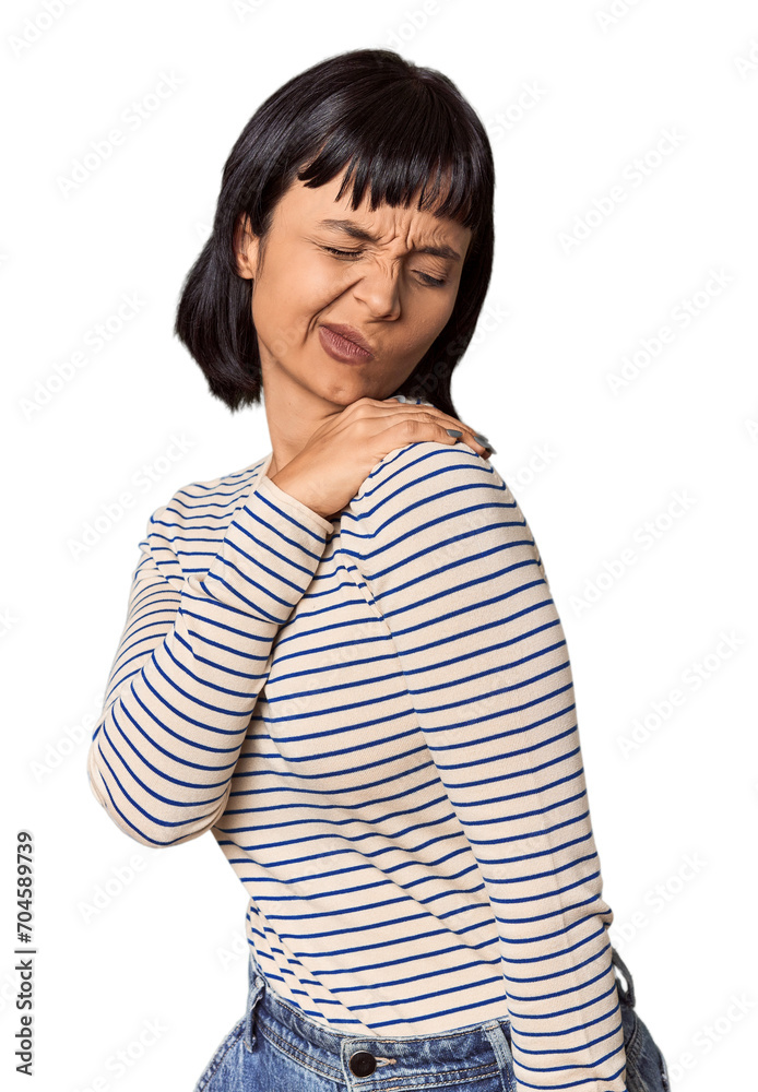 Young Hispanic woman with short black hair in studio having a shoulder pain. Young Hispanic woman with short black hair in studio having a shoulder pain.