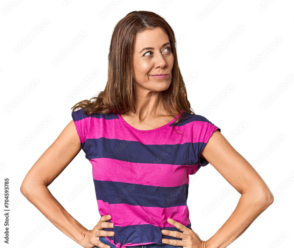 Middle-aged woman portrait in studio setting confused, feels doubtful and unsure. Middle-aged woman portrait in studio setting confused, feels doubtful and unsure.