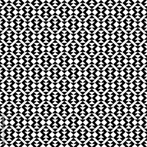 Diamonds, rhombuses, checks, tiles, triangles, arrows seamless pattern. Folk ornament. Ethnic ornate. Geometric image. Tribal wallpaper. Geometrical background. Retro motif. Ethnical textile print.