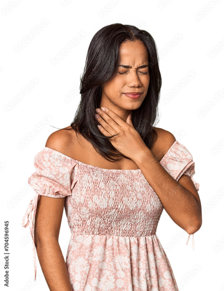 Young Filipina with long black hair in studio suffers pain in throat due a virus or infection. Young Filipina with long black hair in studio suffers pain in throat due a virus or infection.