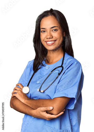 Young Filipina nurse with a stethoscope in studio photo