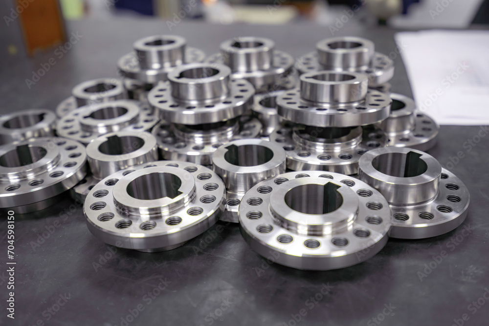 Obraz premium Round parts with holes on the table for sorting and sending for assembly.