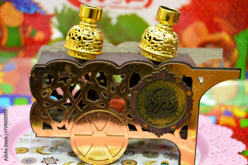 Translation of Arabic text (Ramadan Kareem or Happy generous Ramadan), Ramadan decorative fava beans cart with beans jar container and Fanous lamp lantern decorations for the fasting month for Muslims photo