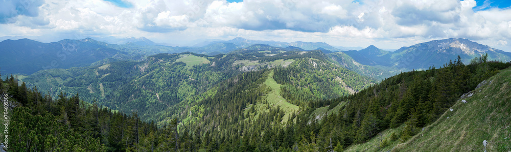 Beautiful panoramic view to famous Ötscher mountain in Lower Austria on a cloudy day. Wonderful and idyllic Ötscherland landscape with hills and lakes