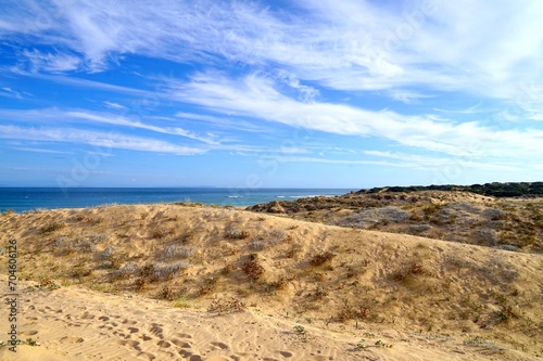 view over the dunes near the lighthouse Faro de Trafalgar at a sandy headland between Los Caños de Meca and Zahora, Vejer de la Frontera, Costa de la Luz, Andalusia, Spain