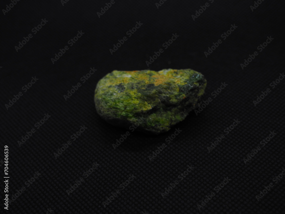 diopside, crystallized greenish stone.