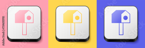 Isometric Bird house icon isolated on pink, yellow and blue background. Nesting box birdhouse, homemade building for birds. Square button. Vector
