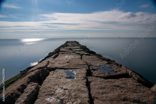Rock jetty reaching into the Long Island Sound