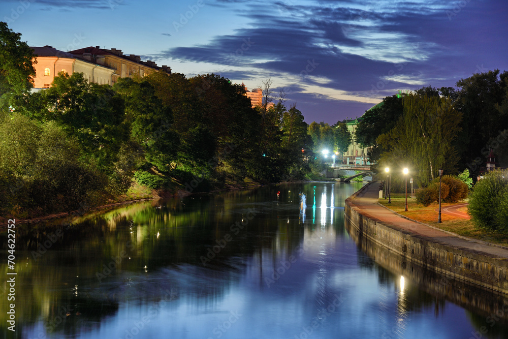 View of river in city park in Minsk at evening time