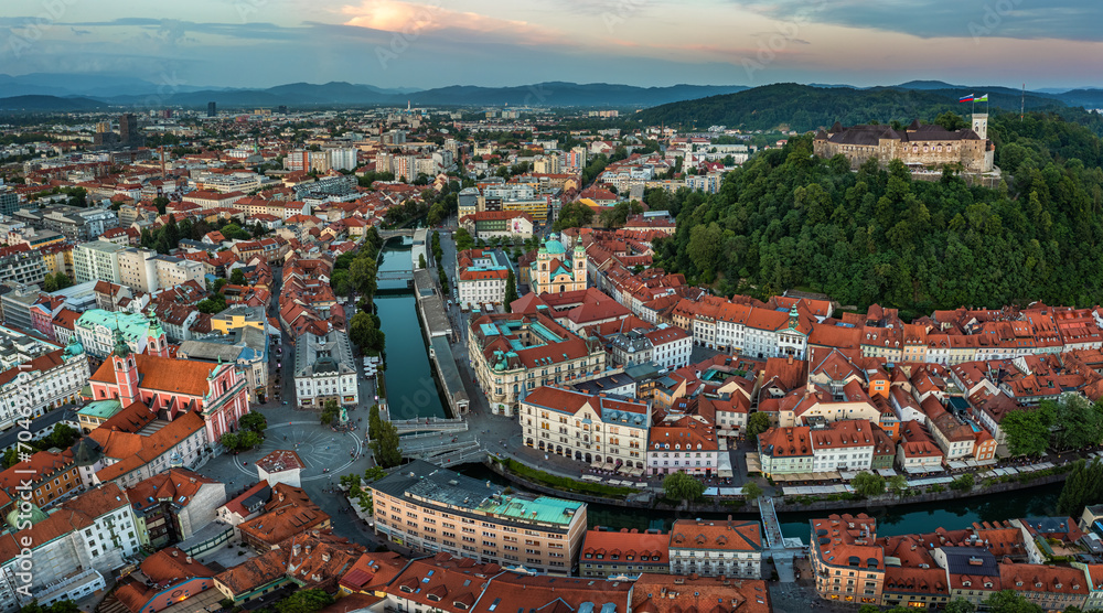 Ljubljana, Slovenia - Aerial panoramic view of Ljubljana on a summer afternoon with Franciscan Church of the Annunciation, Ljubljana Castle, Ljubljana Cathedral and skyline of the capital of Slovenia
