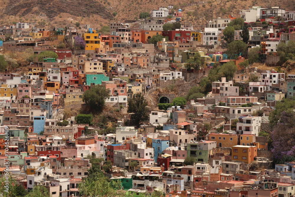 View onto a neighbourhood in Guanajuato with its colorful houses and an entrance to its famous tunnel system, Mexico