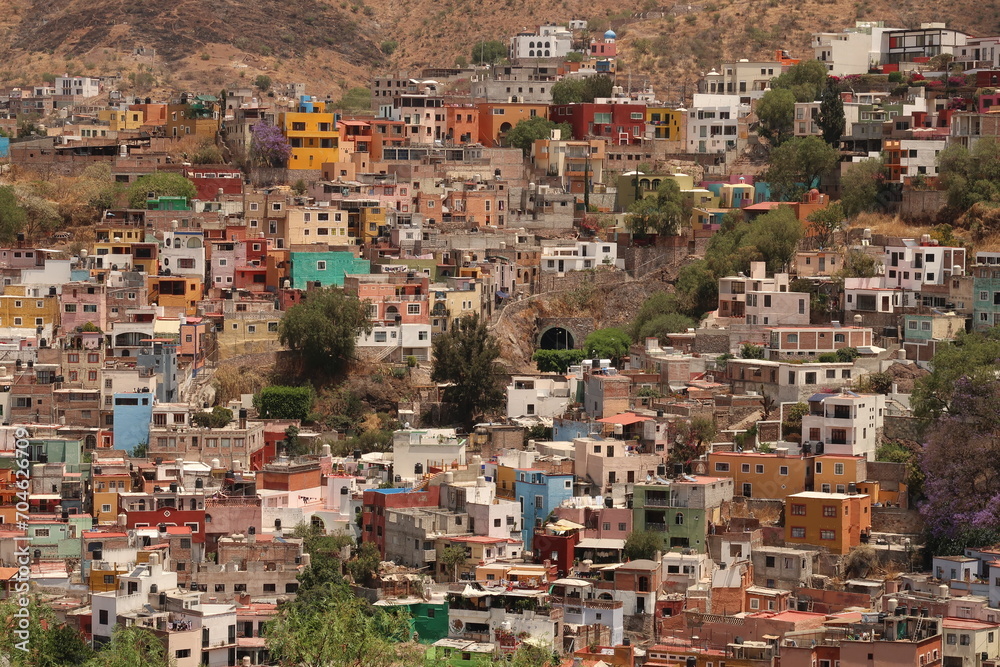 View onto a neighbourhood in Guanajuato with its colorful houses and an entrance to its famous tunnel system, Mexico View onto a neighbourhood in Guanajuato with its colorful houses and an entrance to its famous tunnel system, Mexico