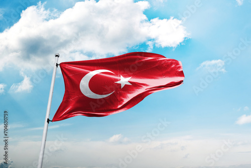 Türk bayrağı ve mavi gökyüzü bulutlar. Translation: Turkish flag and blue sky with clouds.
 photo