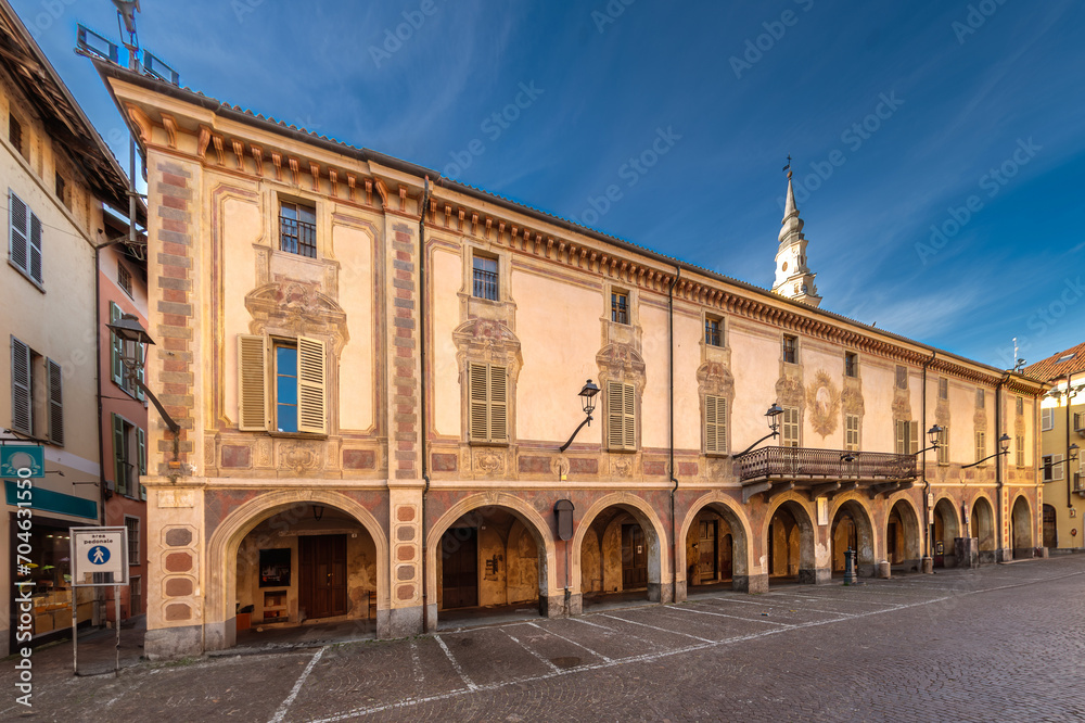 Carignano, Turin, Italy - November 18, 2023: view of the ancient former town hall building in Piazza San Giovanni