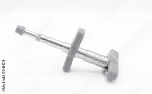 Chiropractic Activator 1 stainless steel tool isolated on white background. spine and joint manipulation adjustment tool