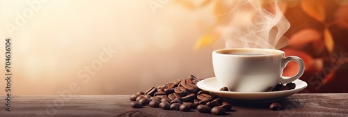 Cup of hot coffee with coffee beans on brown background.Long photo banner for website header design with copy space. Cafe menu concept idea background.