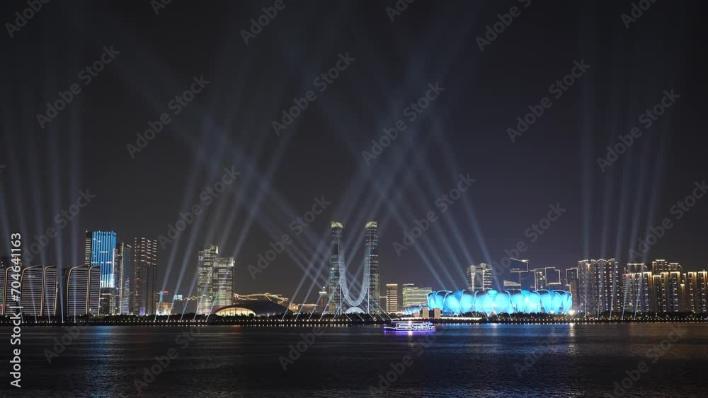 laser lights over modern buildings at night laser lights over modern buildings at night