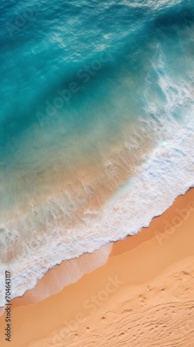 Aerial View of a Beach with a Rolling Wave