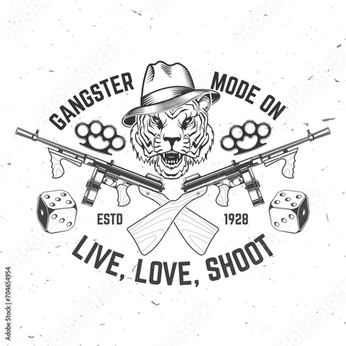 Gangster club badge design. Vector illustration. Vintage monochrome label, sticker, patch with gangster tiger, submachine gun, dice and knuckle duster silhouettes.