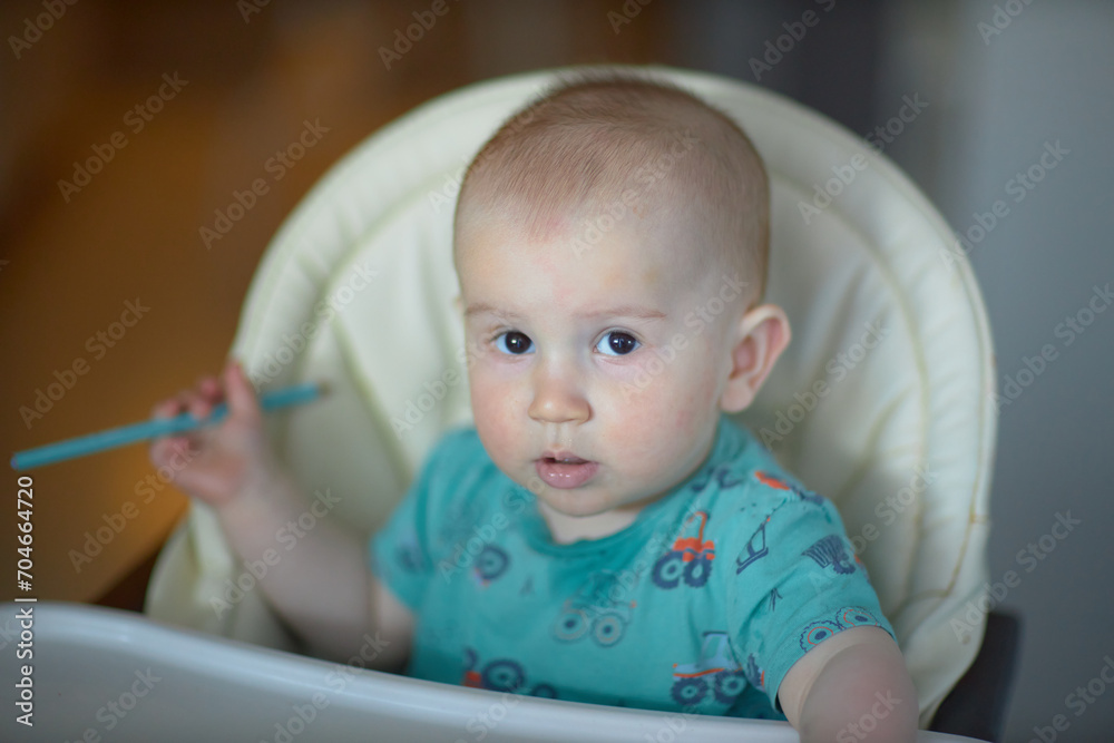A baby is a happy baby in the first months of life, crawling around the house, smiling. A baby is a happy baby in the first months of life, crawling around the house, smiling.