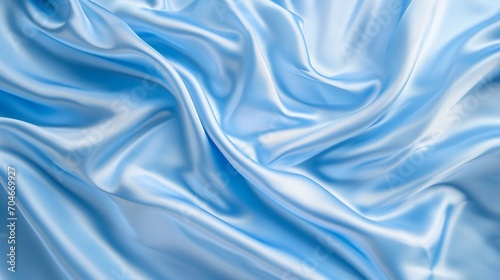 Beautiful light blue silk fabric texture background, silky satin luxury royal rich water wave texture banner backgrounds. © BackgroundHolic