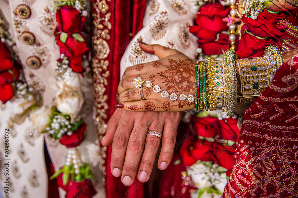 Indian couple's holding hands close up