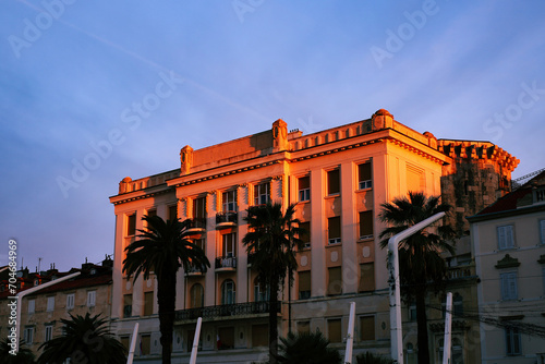 View of the facade of a building in the Riva Walk at sunrise. Split, Croatia photo