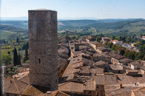 Wide panoramic view over downtown San Gimignano and Torre Ficarelli, seen from Torre Grosso
