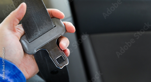 car seatbelt, safety device in vehicle, symbolic protection and security photo