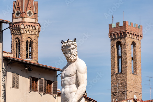 Statue of the famous Neptune fountain at the Piazza della Signoria in Florence photo