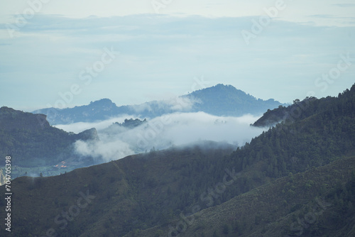 Beautiful panorama of mountains covered with mist