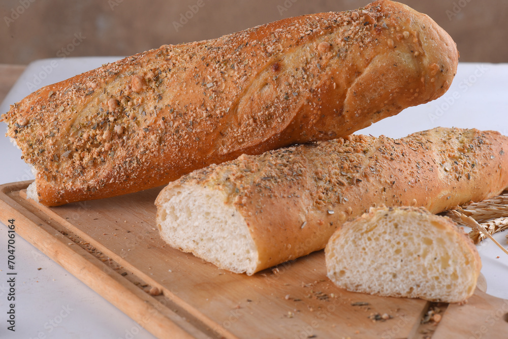 Baked wheat bread with herb seasoning seasoned baguette