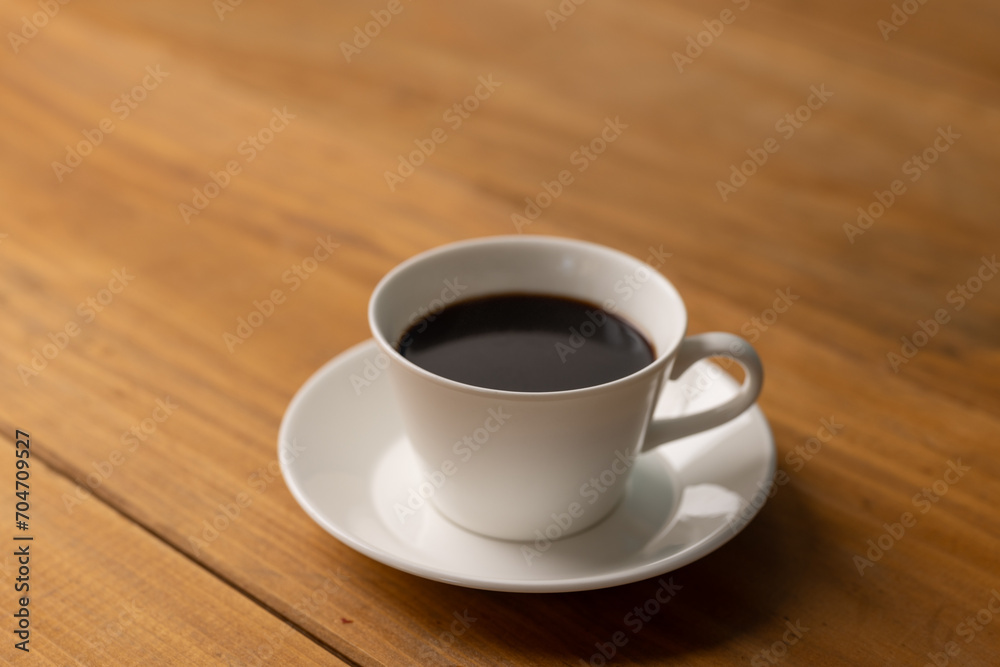 Cup of hot coffee on a table,