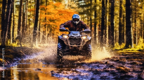 ATV in action splashing water motion blur at trail forest , extreme sports concept.