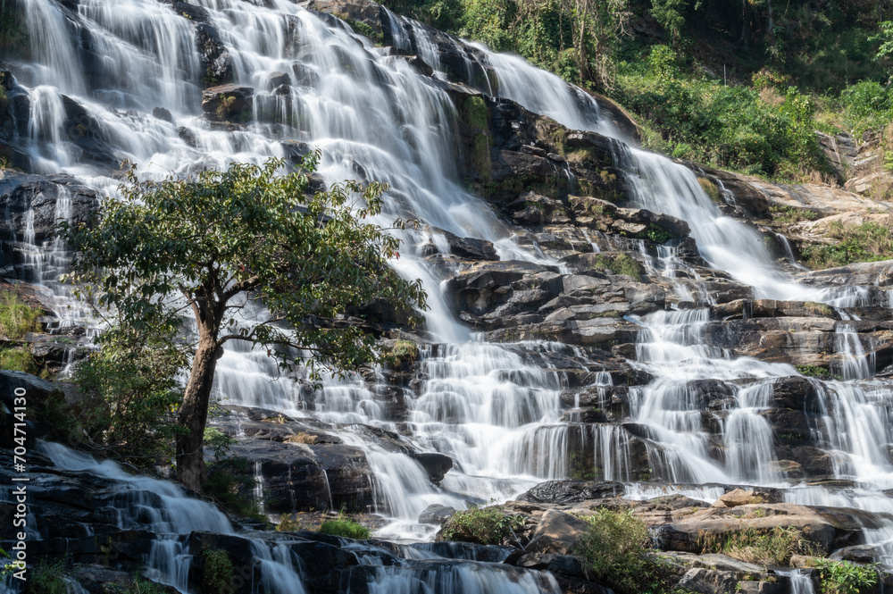 Fototapeta premium Beautiful view of Mae Ya waterfall the largest waterfalls in Doi Inthanon National Park of Chiang Mai province of Thailand.